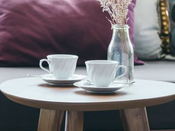 Table, Coffee table, Furniture, Purple, Room, Interior design, Textile, Linens, Tablecloth, Tableware, 