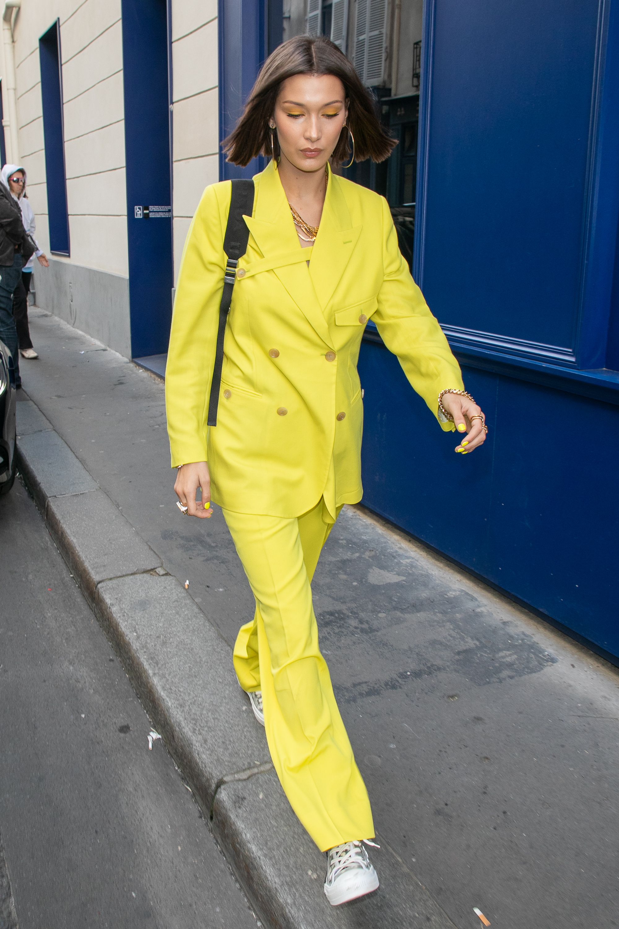 Bella Hadid Models a Yellow Jumpsuit With Chunky Platforms in