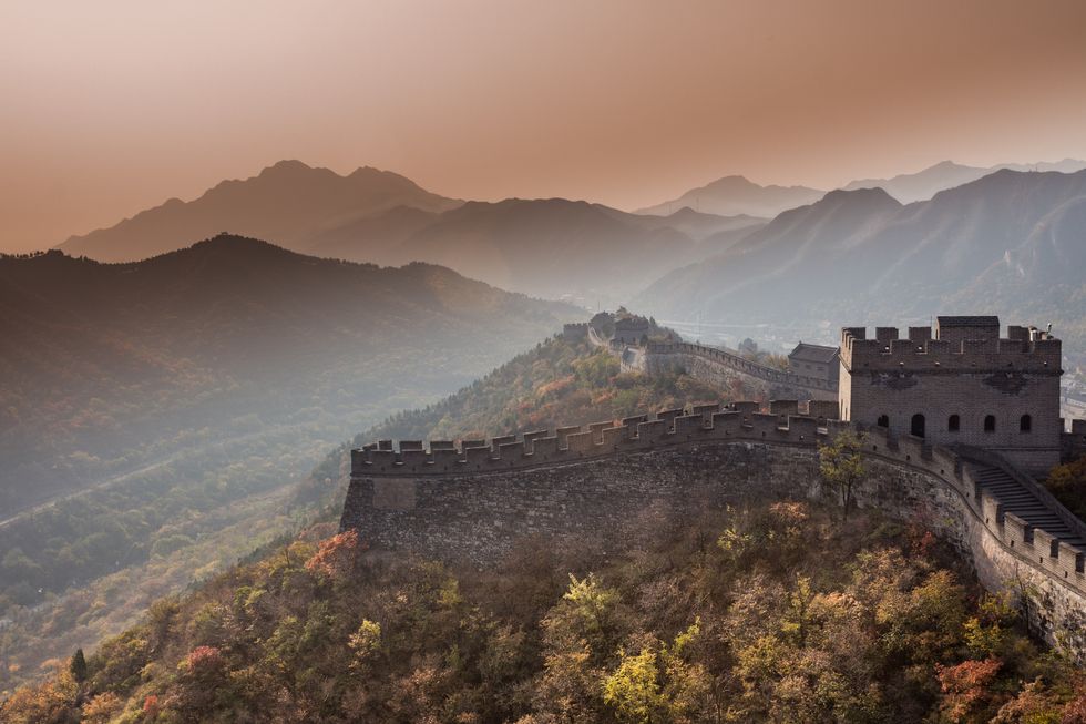 The Great Wall of China over misty mountains, China