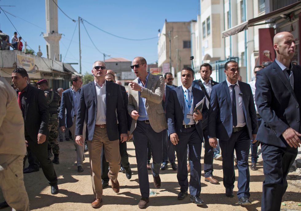 Prince William walks through the Al-Jalazoun refugee camp in the West Bank. 
