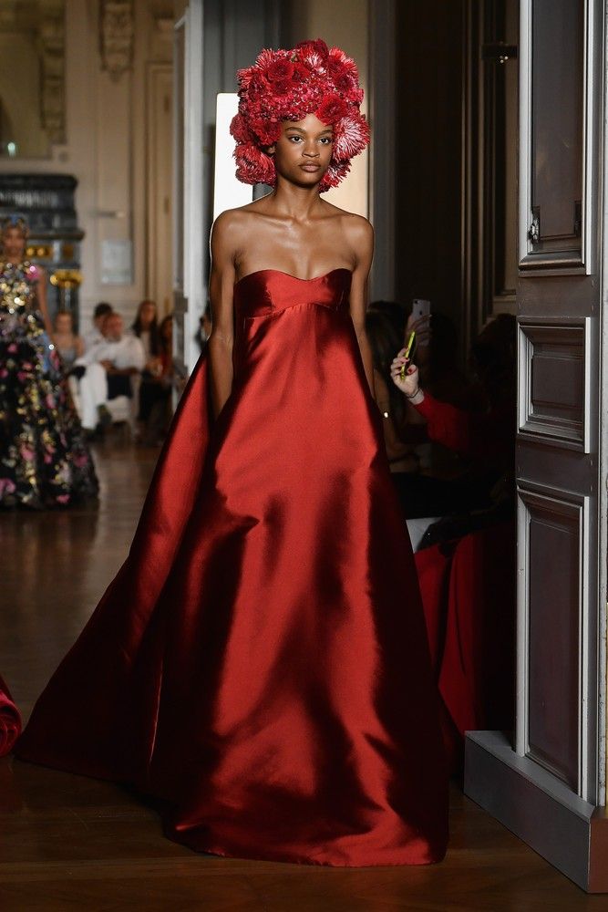 Fashion model, Gown, Haute couture, Dress, Clothing, Fashion, Red, Shoulder, Beauty, Bridal party dress, 