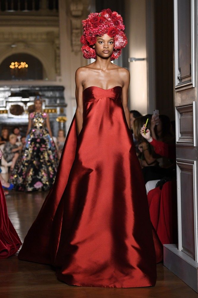 Gown, Fashion model, Dress, Haute couture, Clothing, Fashion, Red, Formal wear, Bridal party dress, Shoulder, 