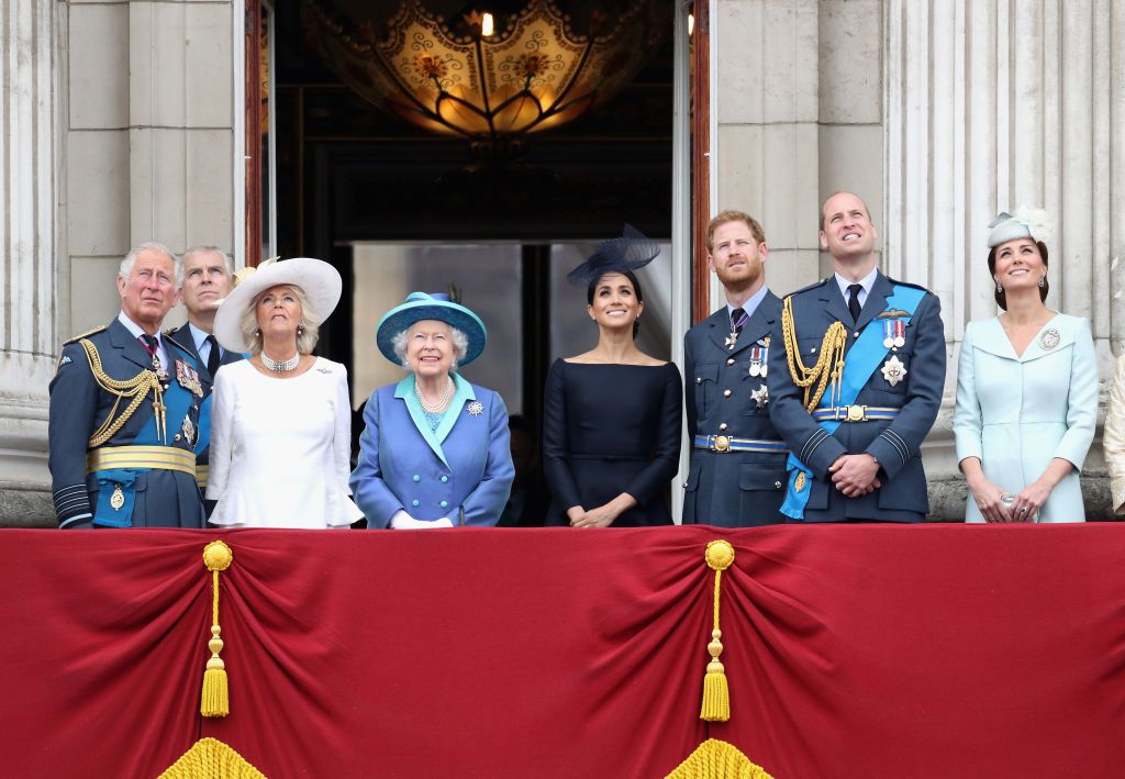 london, england   july 10  l r prince charles, prince of wales, prince andrew, duke of york, camilla, duchess of cornwall, queen elizabeth ii, meghan, duchess of sussex, prince harry, duke of sussex, prince william, duke of cambridge and catherine, duchess of cambridge watch the raf flypast on the balcony of buckingham palace, as members of the royal family attend events to mark the centenary of the raf on july 10, 2018 in london, england  photo by chris jacksongetty images
