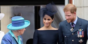 london, england   july 10  l r  queen elizabeth ii, meghan, duchess of sussex, prince harry, duke of sussex watch the raf flypast on the balcony of buckingham palace, as members of the royal family attend events to mark the centenary of the raf on july 10, 2018 in london, england  photo by chris jacksongetty images