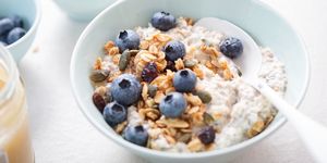 joe wicks overnight oats recipes overnight oats with granola, dried cranberries, pumpkin seeds and blueberries