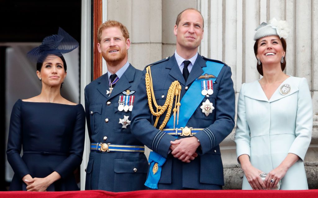 london, united kingdom july 10 embargoed for publication in uk newspapers until 24 hours after create date and time meghan, duchess of sussex, prince harry, duke of sussex, prince william, duke of cambridge and catherine, duchess of cambridge watch a flypast to mark the centenary of the royal air force from the balcony of buckingham palace on july 10, 2018 in london, england the 100th birthday of the raf, which was founded on on 1 april 1918, was marked with a centenary parade with the presentation of a new queens colour and flypast of 100 aircraft over buckingham palace photo by max mumbyindigogetty images