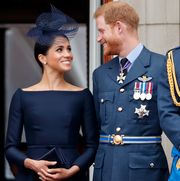 london, united kingdom   july 10 embargoed for publication in uk newspapers until 24 hours after create date and time meghan, duchess of sussex and prince harry, duke of sussex watch a flypast to mark the centenary of the royal air force from the balcony of buckingham palace on july 10, 2018 in london, england the 100th birthday of the raf, which was founded on on 1 april 1918, was marked with a centenary parade with the presentation of a new queens colour and flypast of 100 aircraft over buckingham palace photo by max mumbyindigogetty images