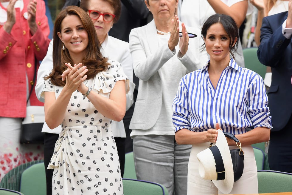 london, england july 14: catherine, duchess of cambridge and meghan, duchess of sussex attends day twelve of the wimbledon tennis championships at the all england lawn tennis and croquet club on july 13, 2018 in london, england. (photo by karwai tang/wireimage )