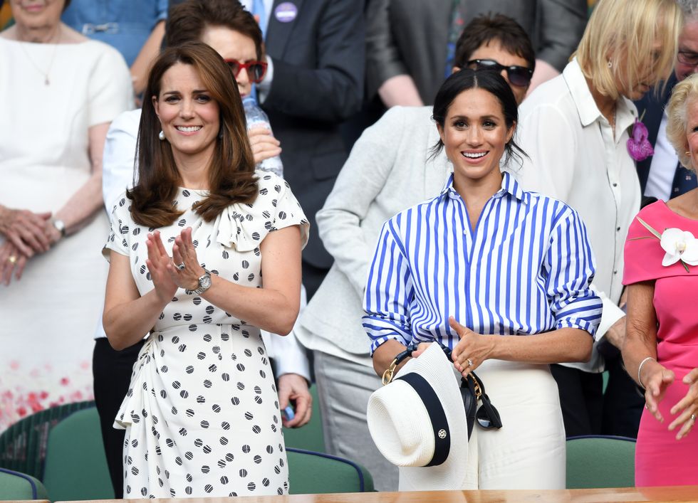 london, england   july 14  catherine, duchess of cambridge and meghan, duchess of sussex attend day twelve of the wimbledon tennis championships at the all england lawn tennis and croquet club on july 14, 2018 in london, england  photo by karwai tangwireimage