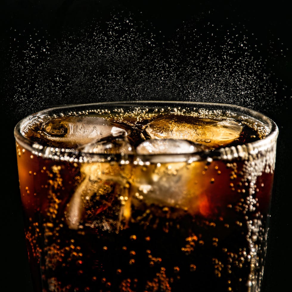 Close-Up Of Drink Against Black Background