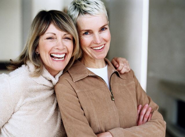 a couple of women smiling gsk