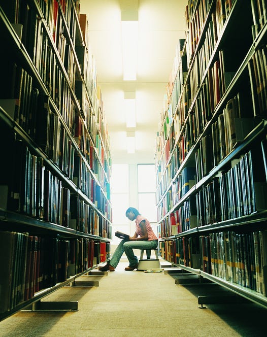 Building, Architecture, Light, Library, Urban area, Design, Aisle, Symmetry, Street, Public library, 