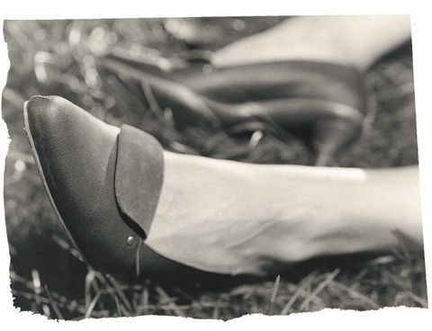 woman wearing shoes in the grass