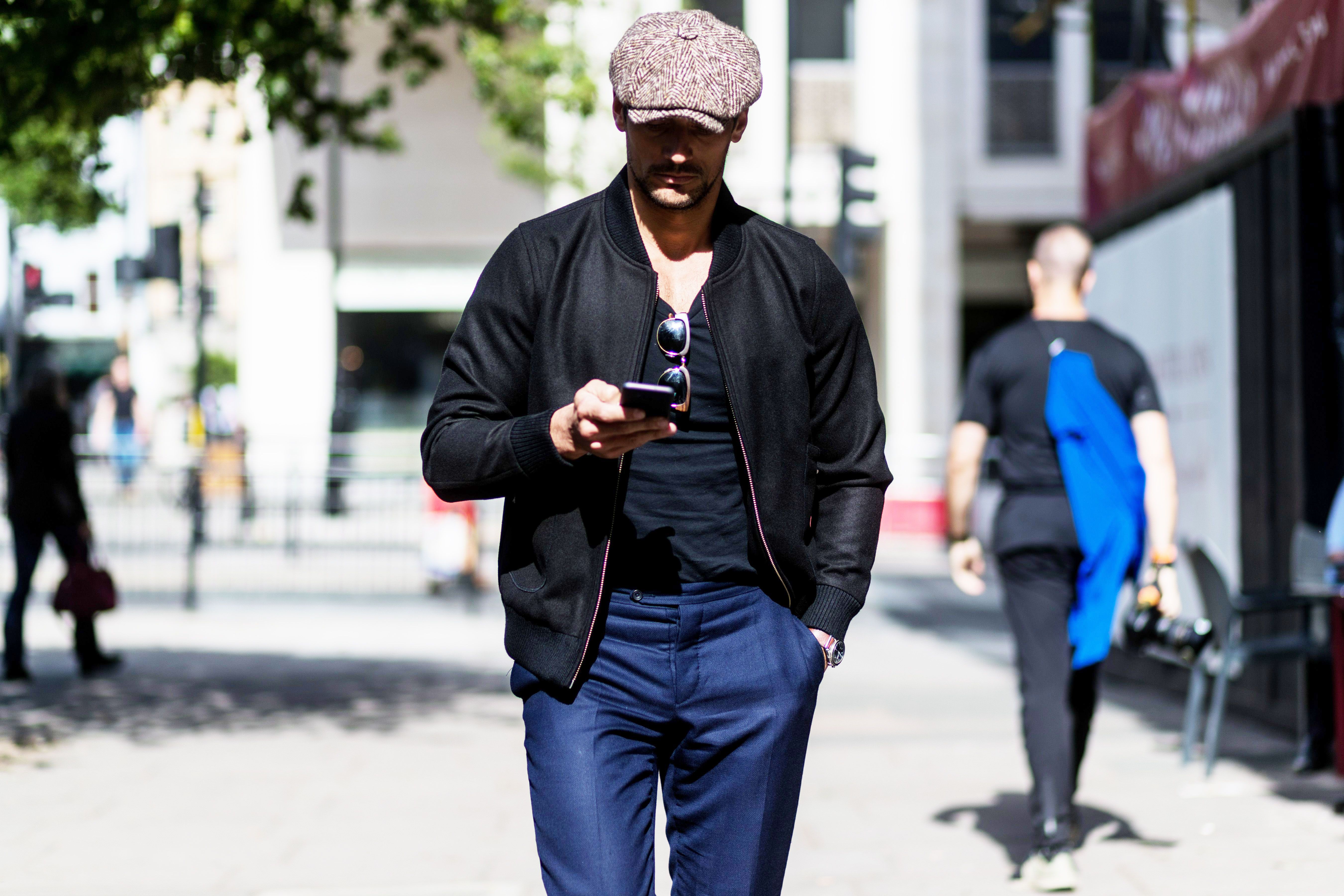 Navy blue dress shop pants with black shirt