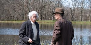 l to r tom conti is albert einstein and cillian murphy is j robert oppenheimer in oppenheimer, written, produced, and directed by christopher nolan