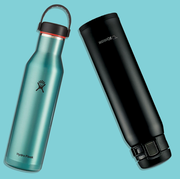 water bottles from hydroflask, camelbak, swell and zojirushi on a blue background