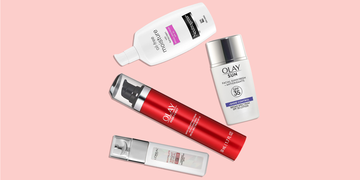 bottles of neutrogena olay and l'oreal moisturizers with spf on a white background