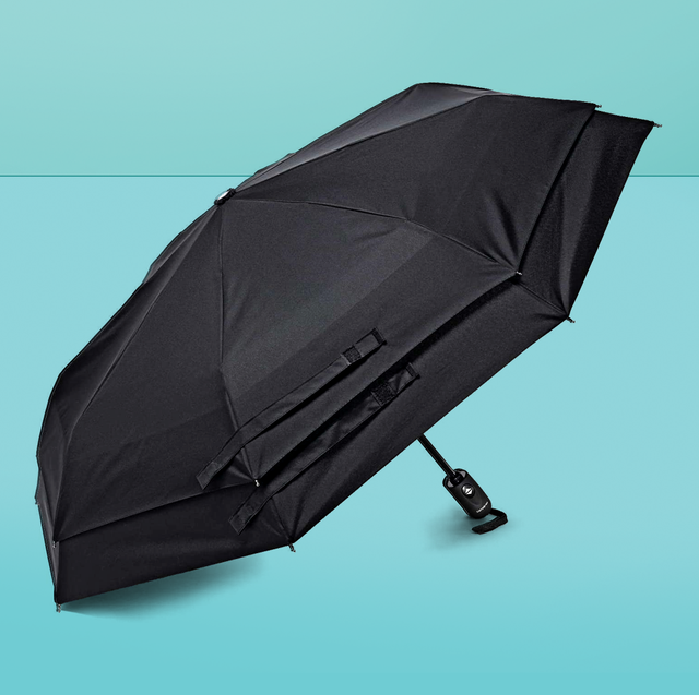 a black umbrella on a blue background