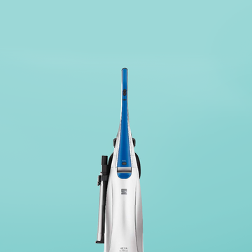 good housekeeping best vacuum for pet hair on blue background