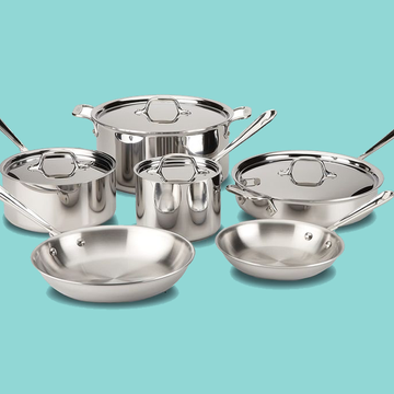 a group of metal pots and pans