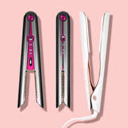 dyson corarale hair straightener and lucea id 1 inchh smart flat iron on light pink background good housekeeping picks for best hair straightener