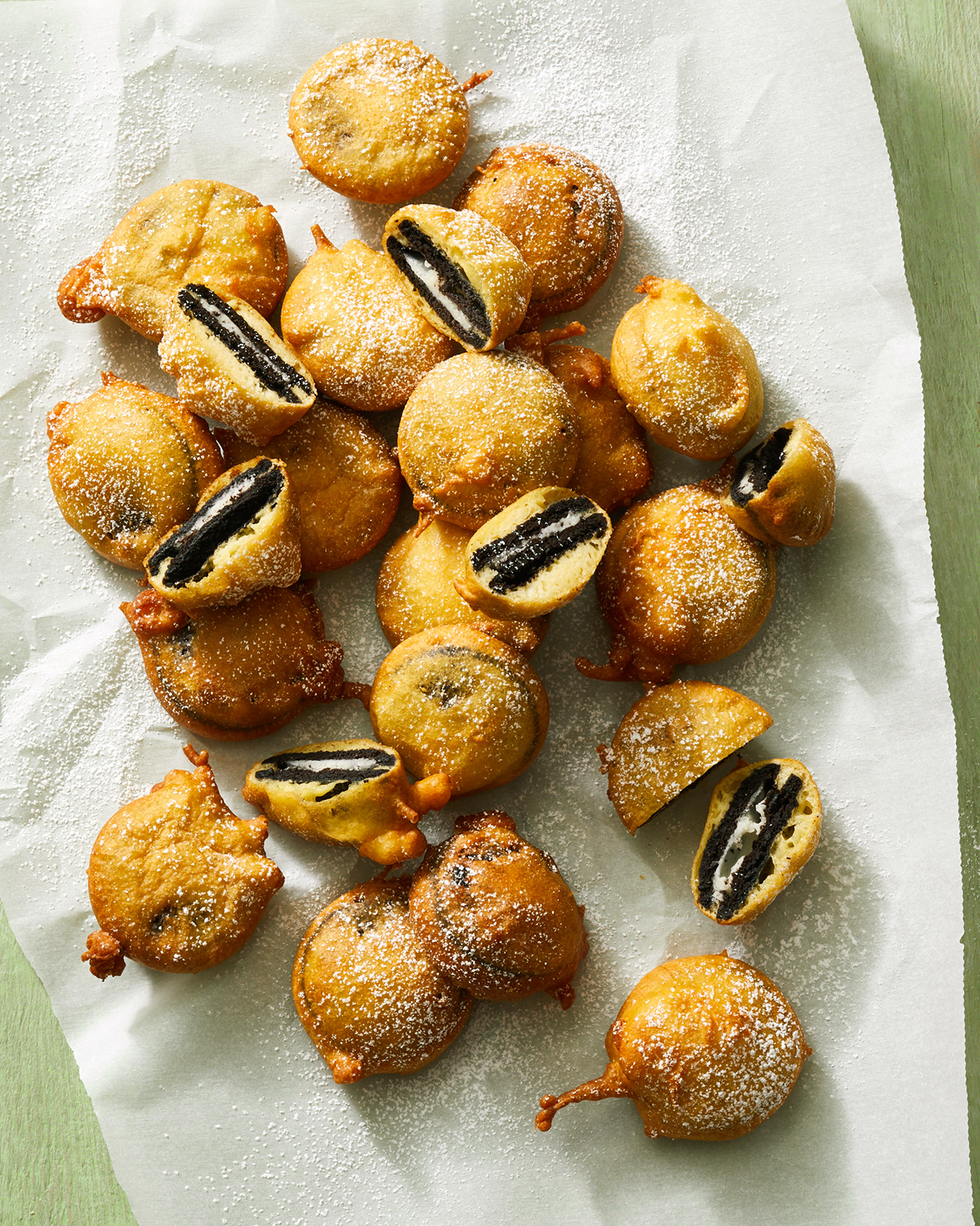 deep fried oreos with powdered sugar on top