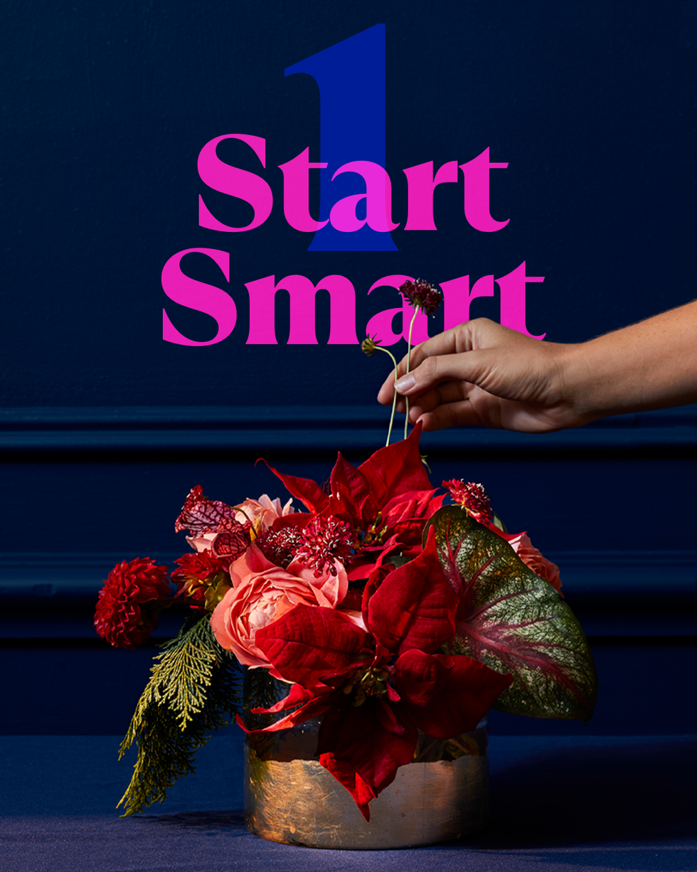floral arrangement with vibrant red and pink flowers and greenery accompanied by text that reads start smart and the number 1