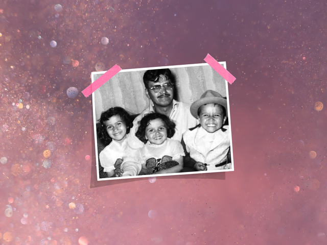 family photo with three children and an adult sitting together in black and white