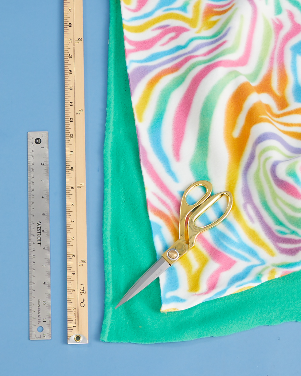 tie blanket, materials for a tie blanket, fleece, scissors, yardstick and ruler