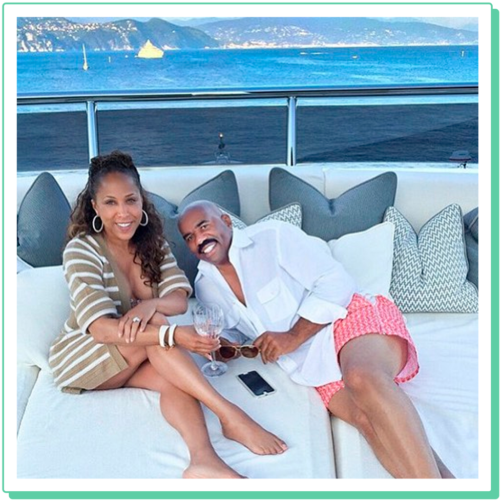 steve harvey with wife marjorie on a boat