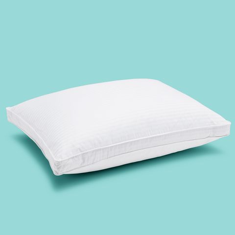 gh ultimate bedding guide teaser, white pillow on teal background