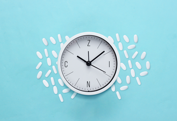 clock spelling out zinc with a zinc supplements surrounding on surface
