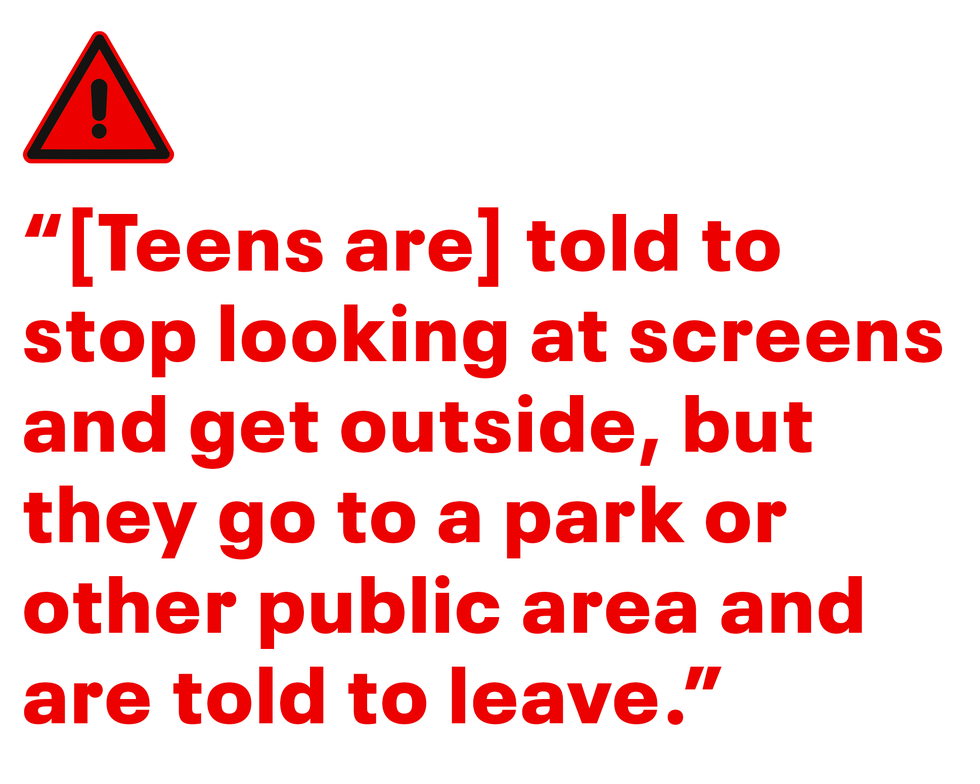 teens sitting on a bench with a skateboard and book bags and sign that says danger teens on the loose