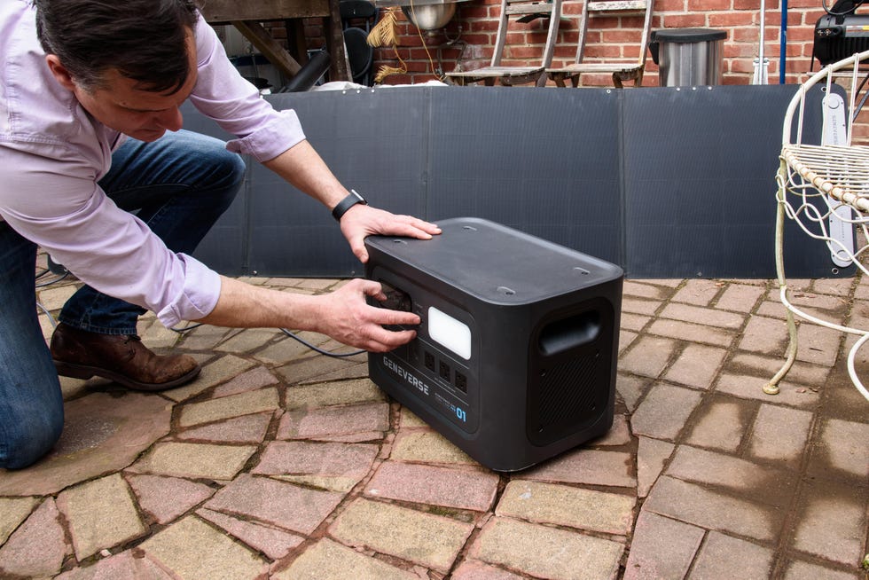 a good housekeeping expert tests the solar panel capacity of a solar generator