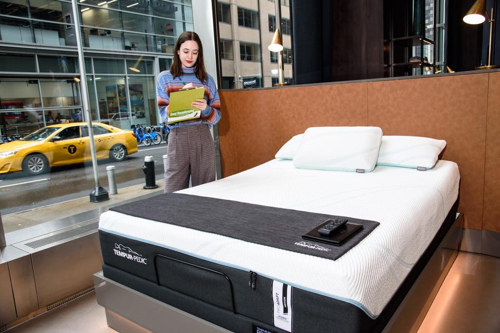 a gh analyst inspecting a tempur pedic mattress