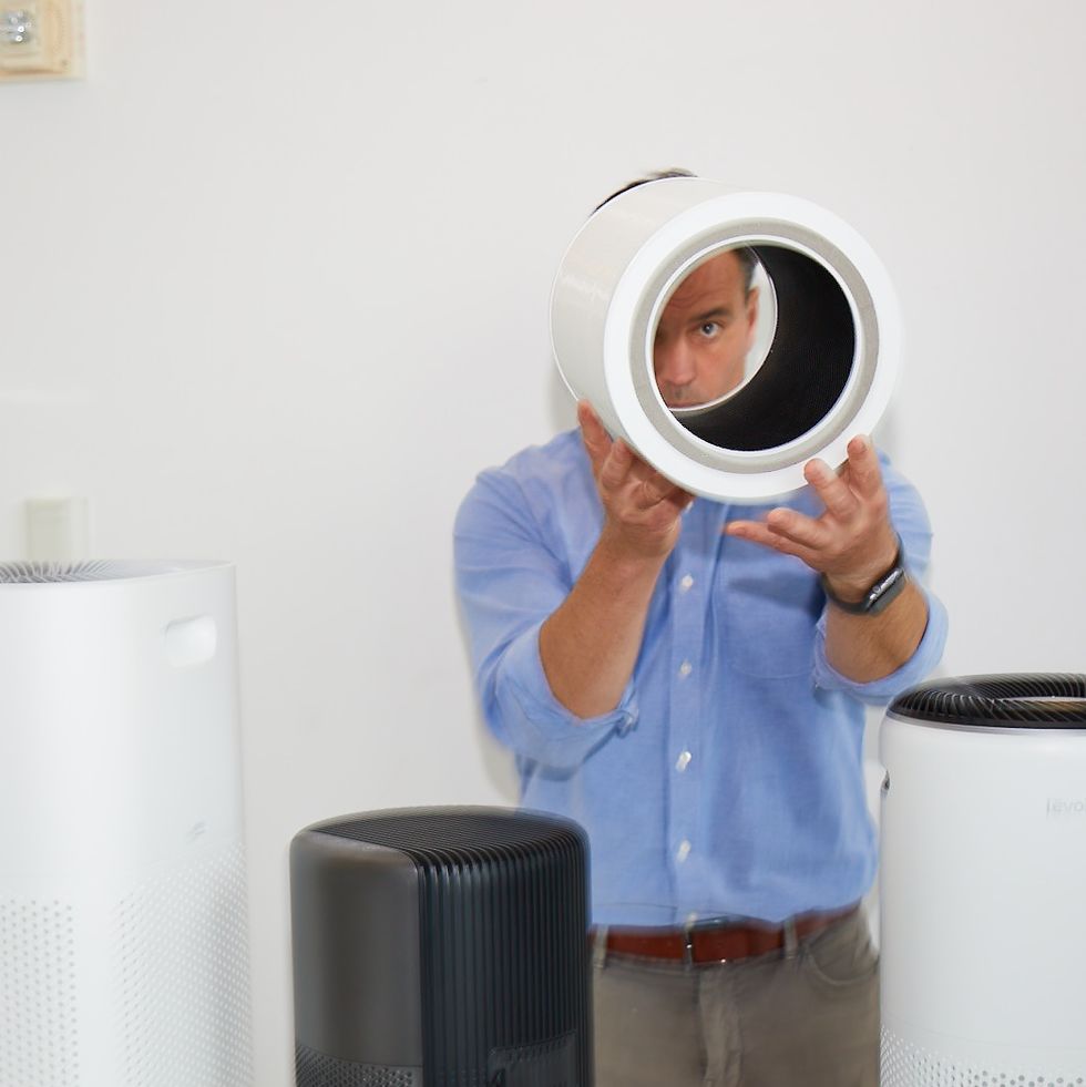 a product expert evaluates filters as part of good housekeeping's review of air purifiers