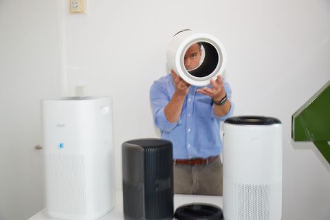 a product expert evaluates filters as part of good housekeeping's review of air purifiers