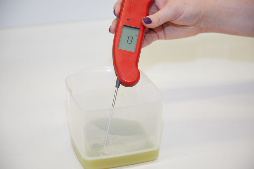 taking the temperature of a juice