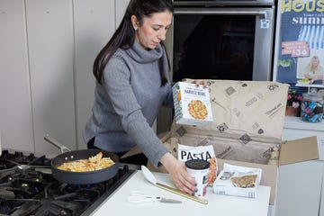 sassos unboxing and cooking a variety of daily harvest products in a kitchen
