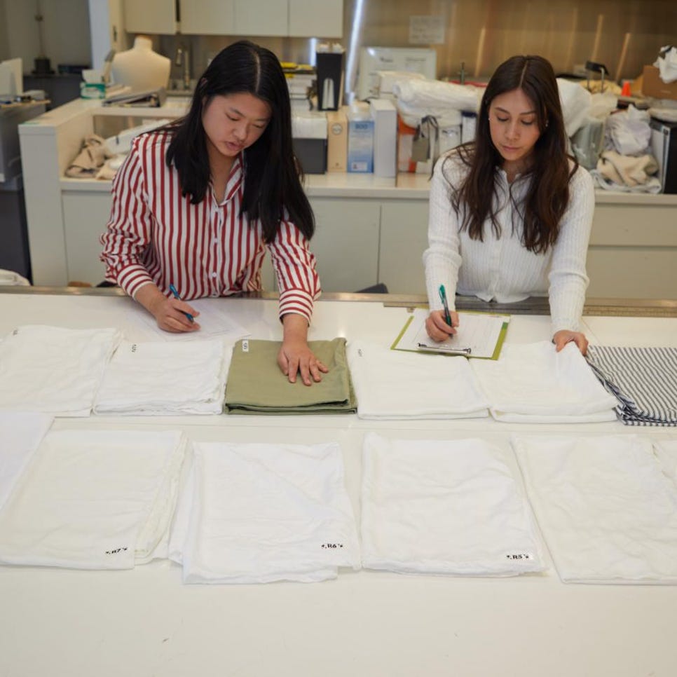 sheets softness testing two women in the lab testing sheet softness