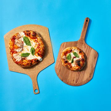 pizza peels with pizza on top