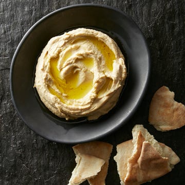 homemade hummus new years eve appetizers homemade hummus with torn pita on the side