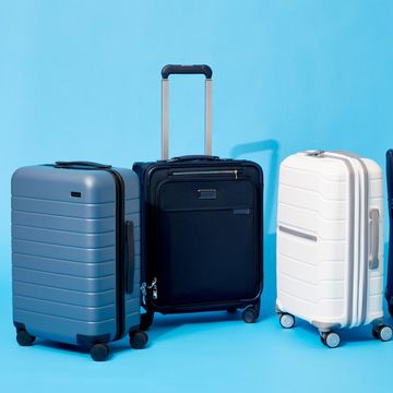 carry on luggage with a blue background