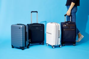 carry on luggage with a blue background