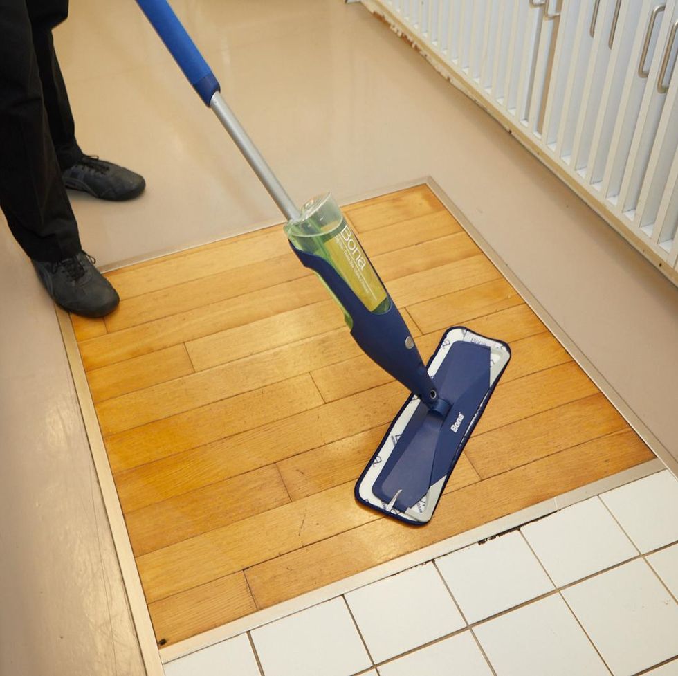 best mops testing a mop on a wood floor