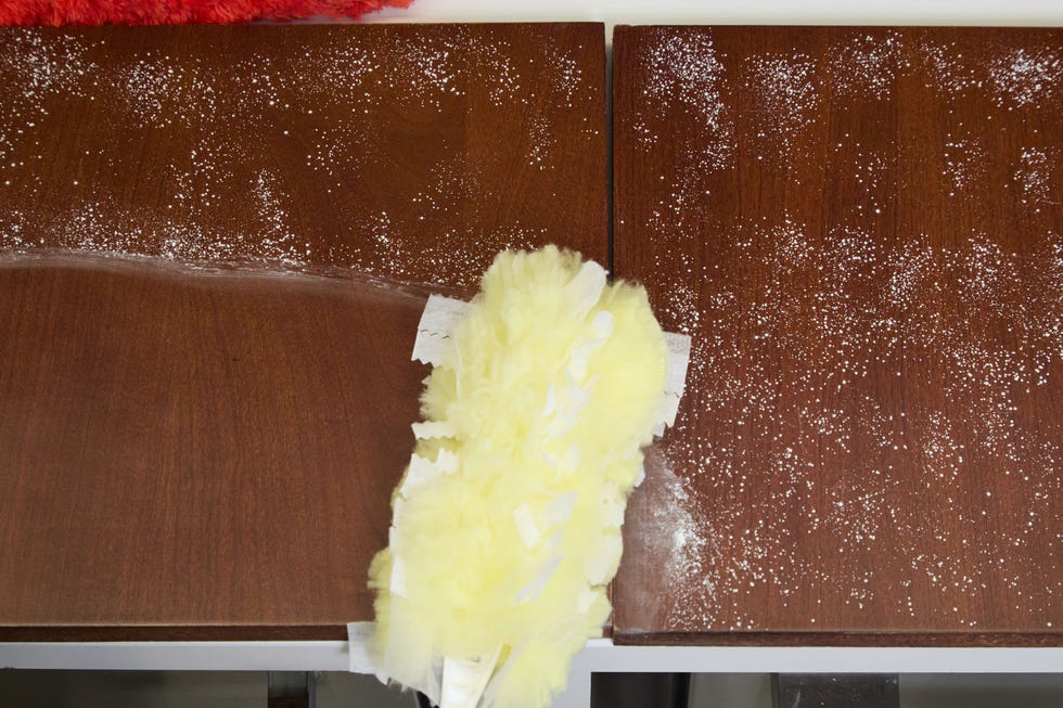 testing the best dusters by swiping particles on a wood surface