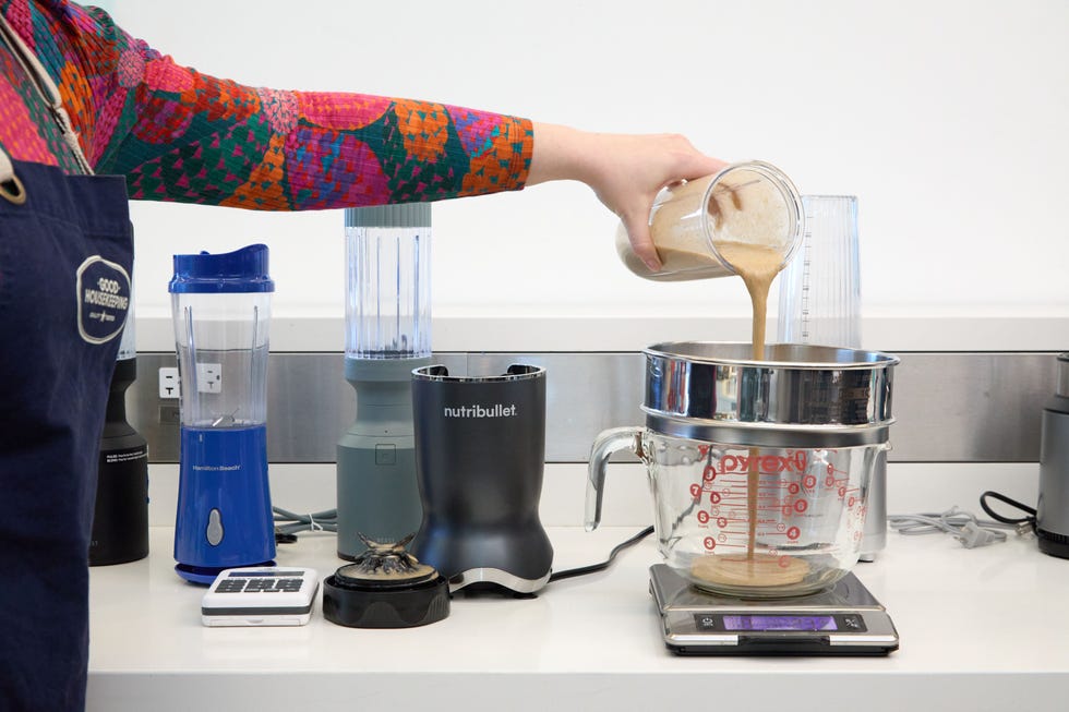 pouring personal blender in sieve