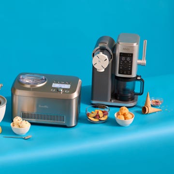 three ice cream makers with ice cream, bowls, spoons, cones and peaches three ice cream makers with ice cream, bowls, spoons, cones and peaches