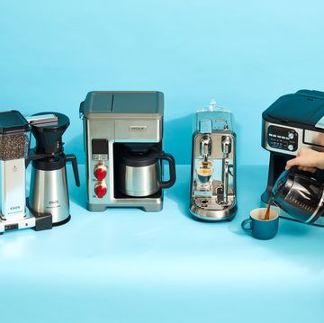 four different high end coffee makers shown on a blue background