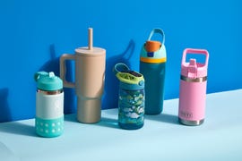 a group of kids water bottles